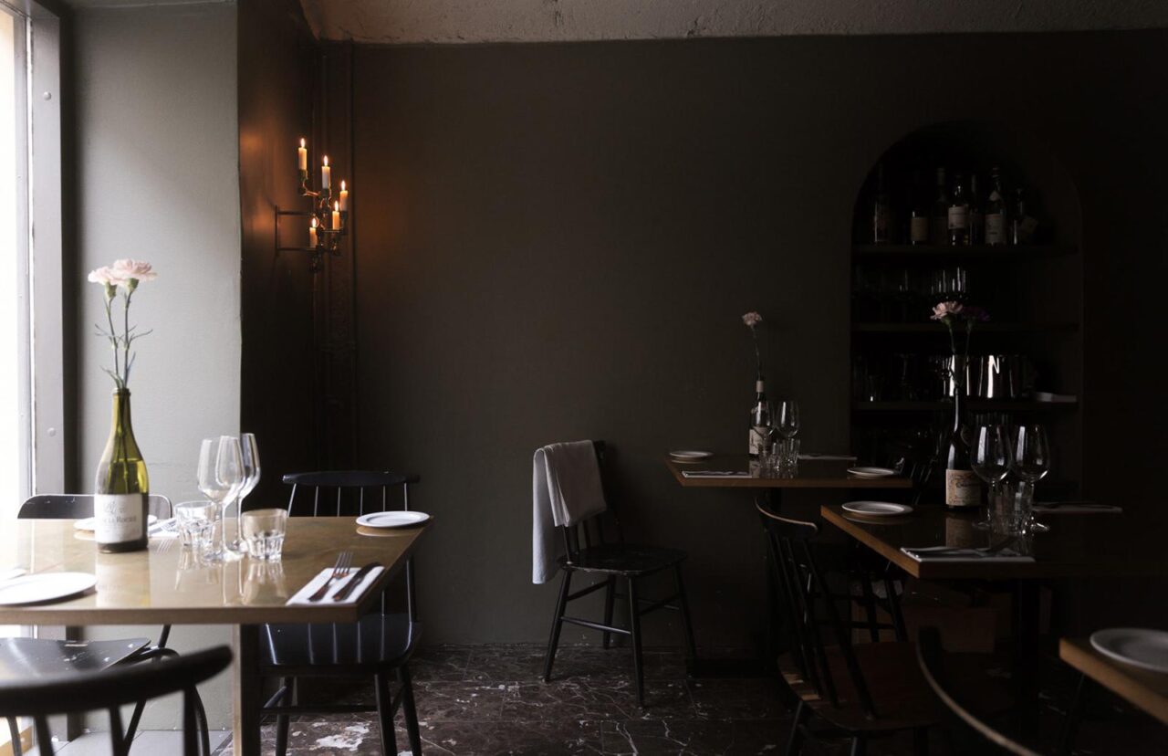 Elegant restaurant Kuurna with minimalist decor.