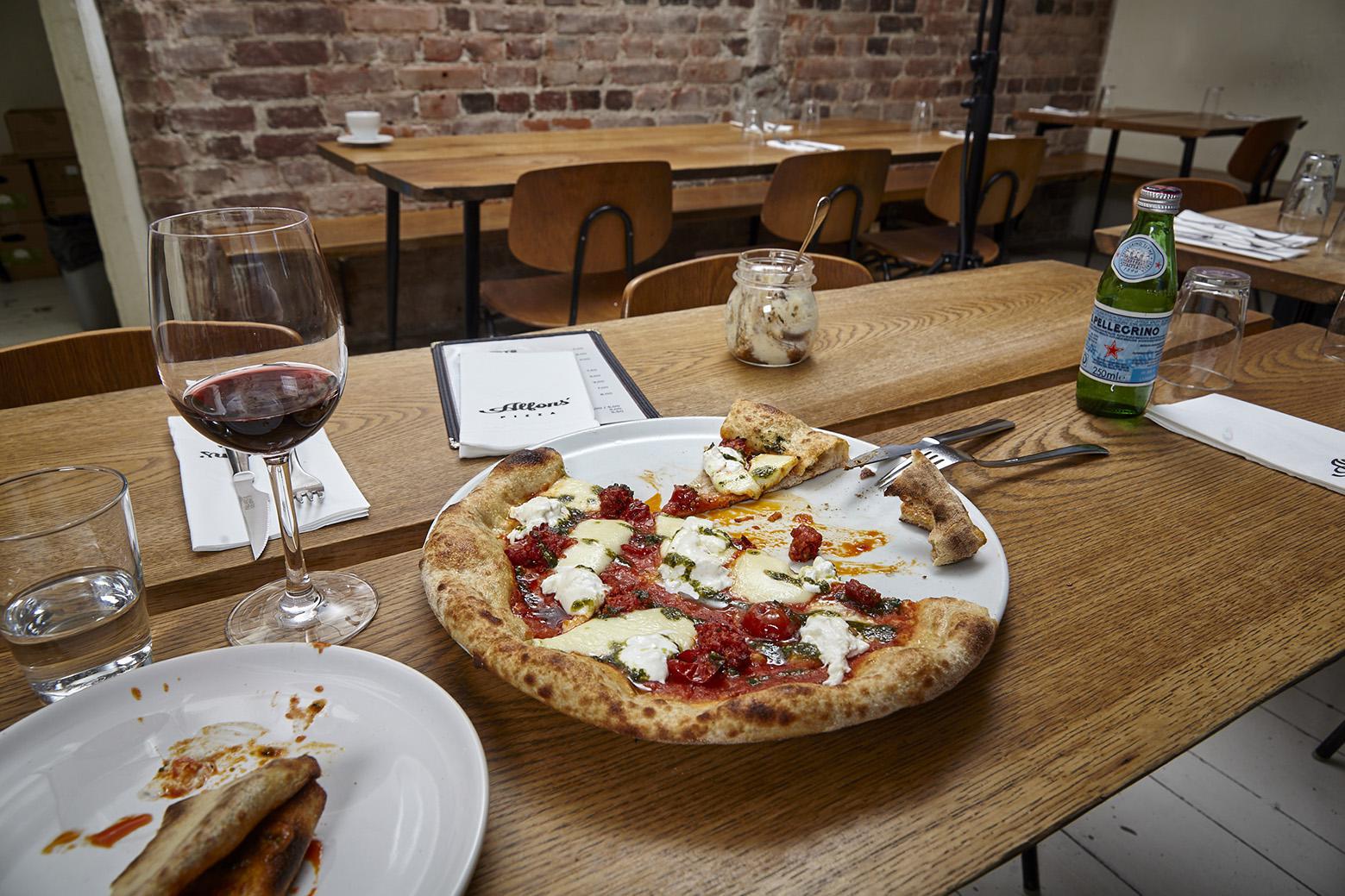 Delicious pizzas are served at Alfons' Pizza