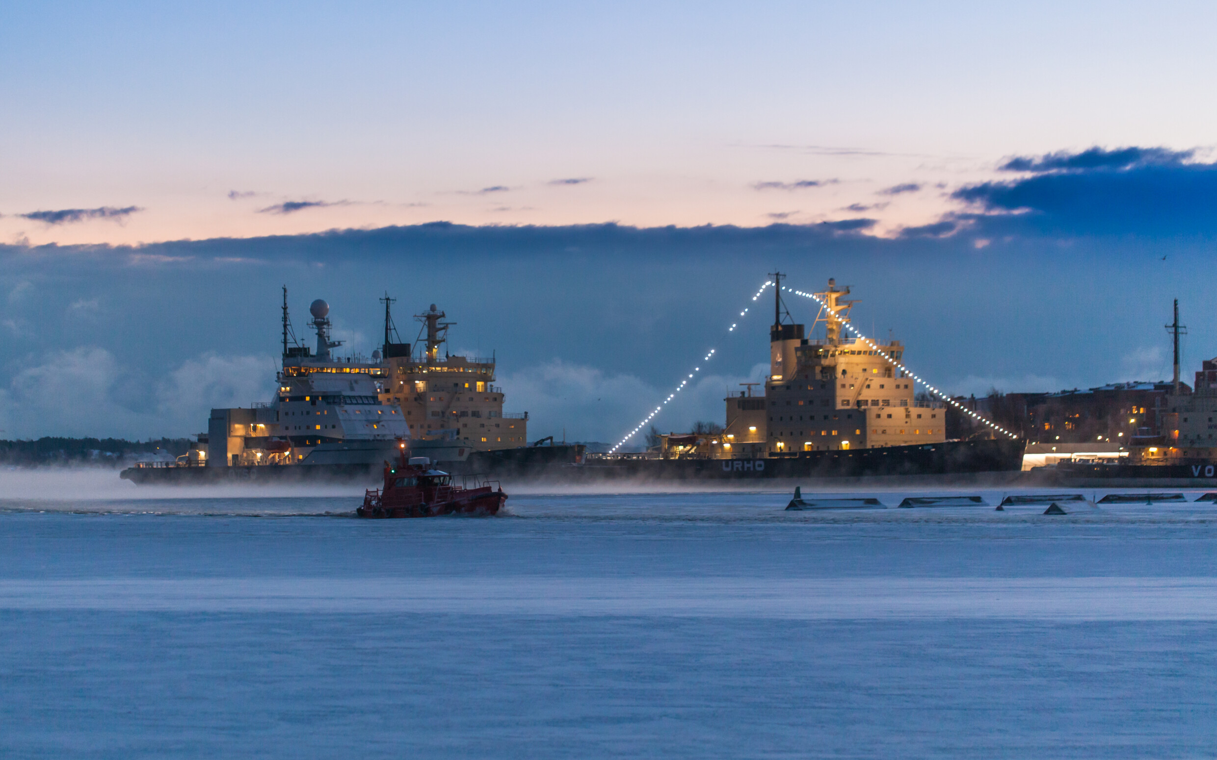 Icebreakers in the dark in Helsinki