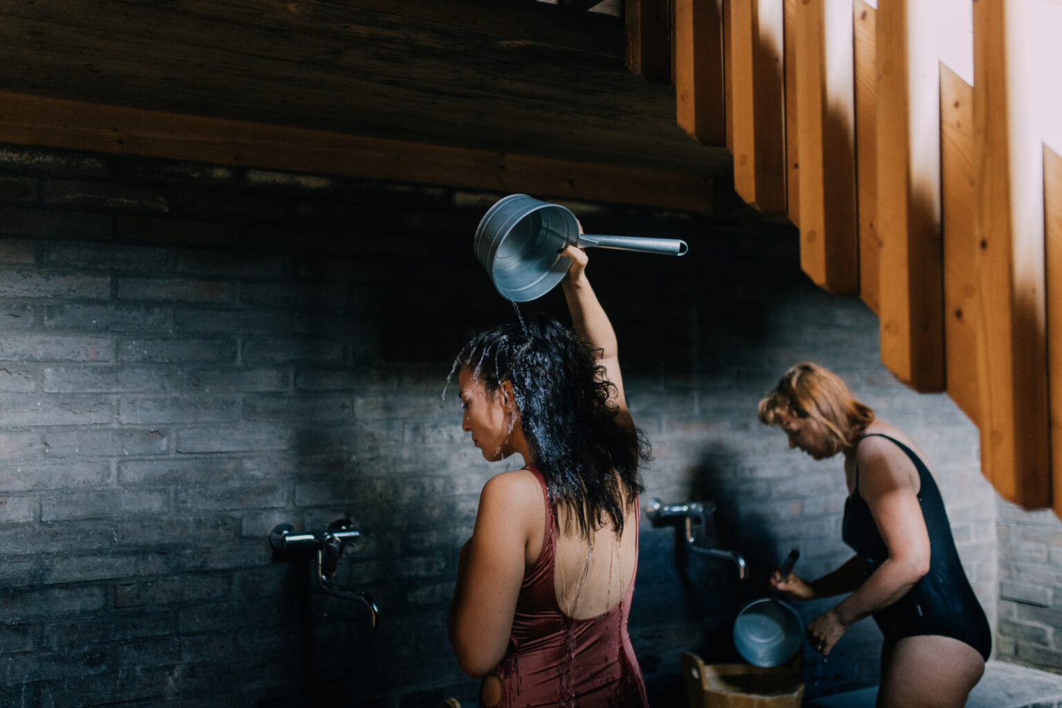 Women washing at Lonna sauna in Helsinki