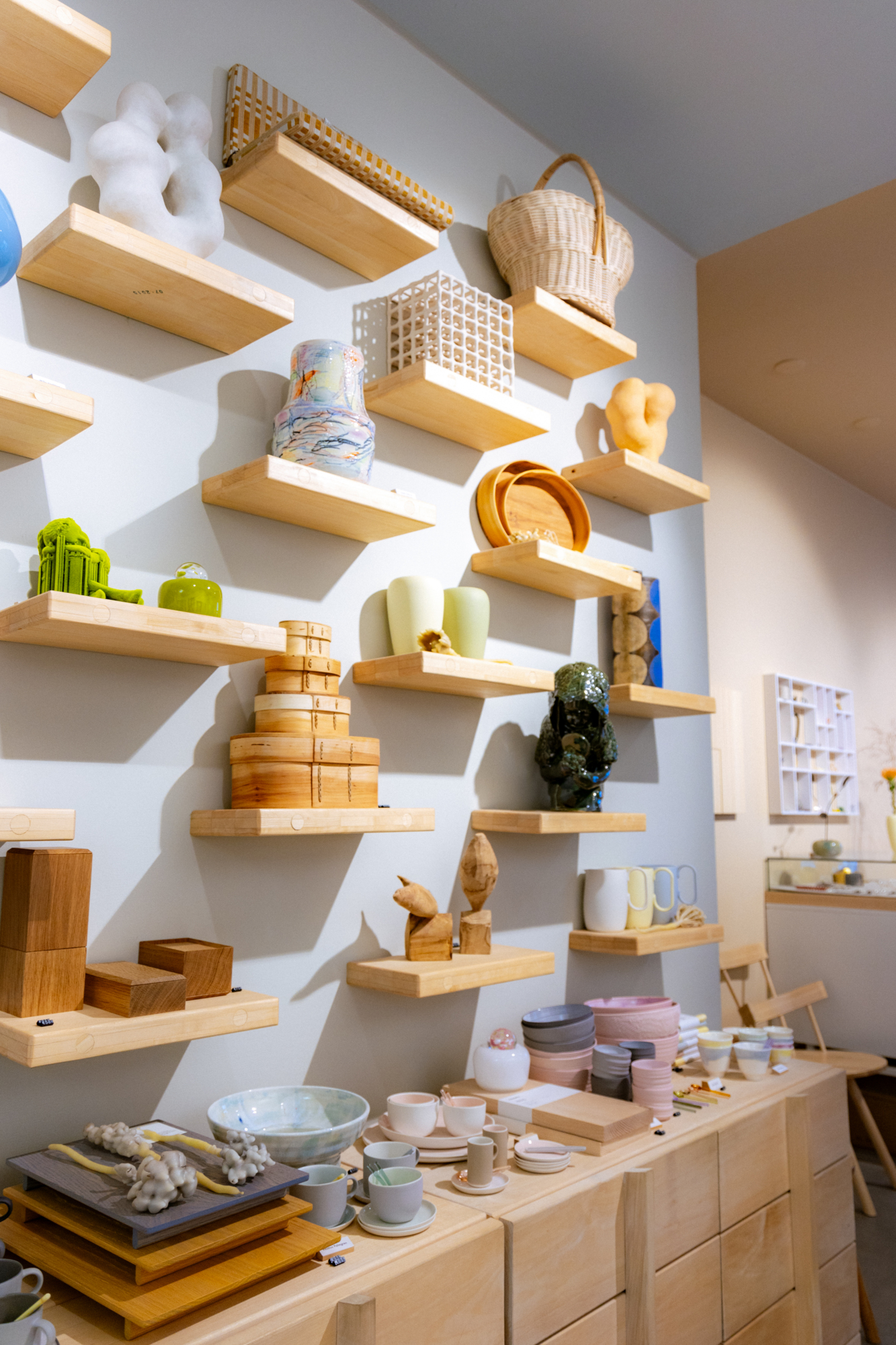 a wall with shelves and objects on it