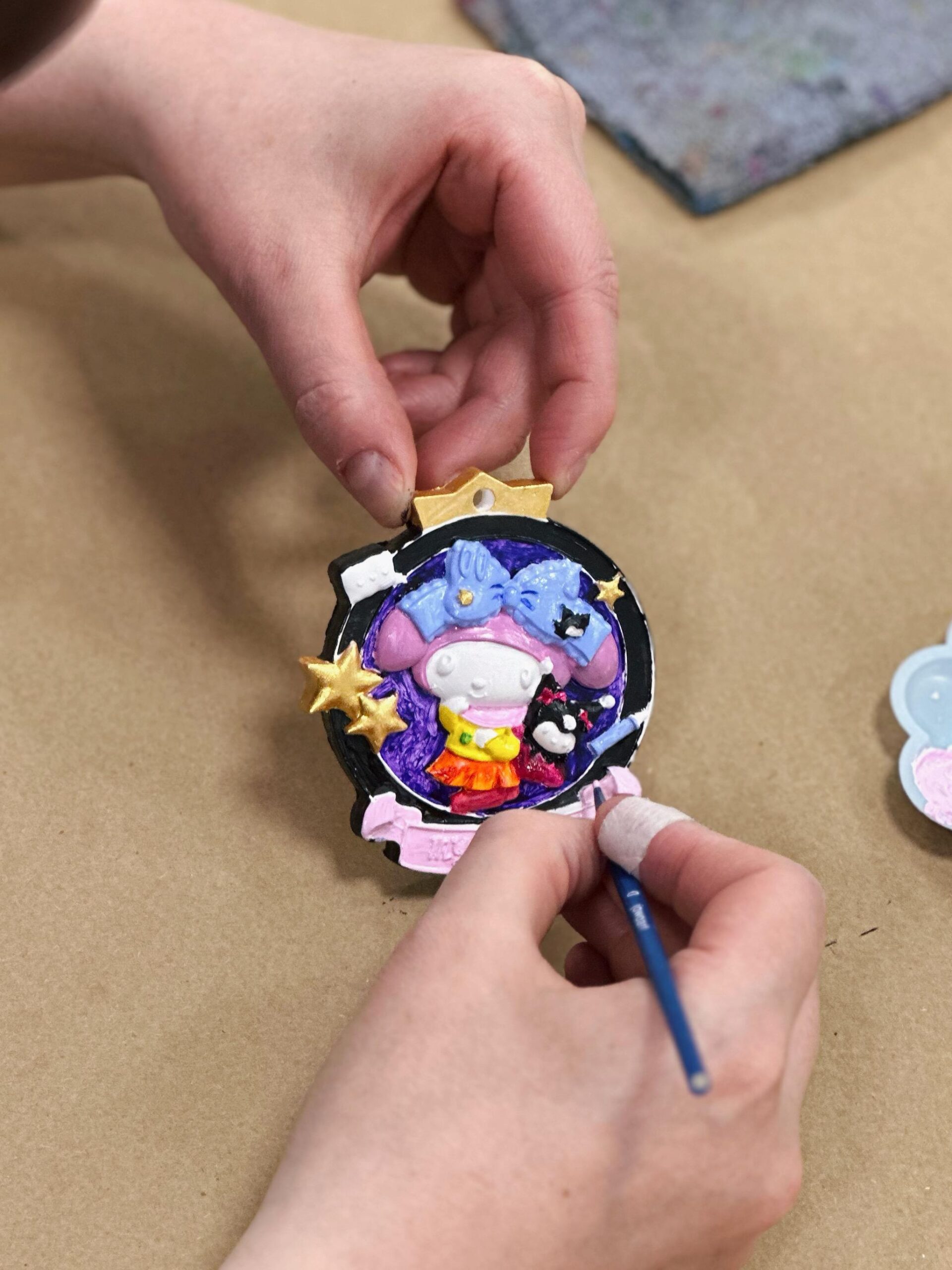A person is doing crafts.