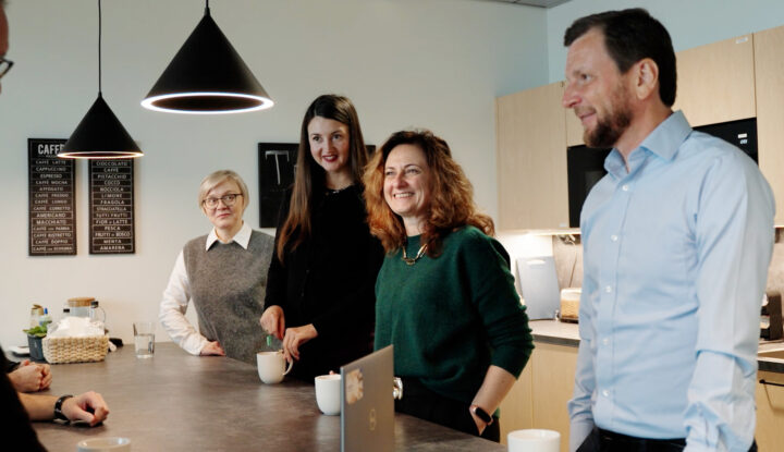 Team members of Corning Scientific Center enjoying a coffee break.