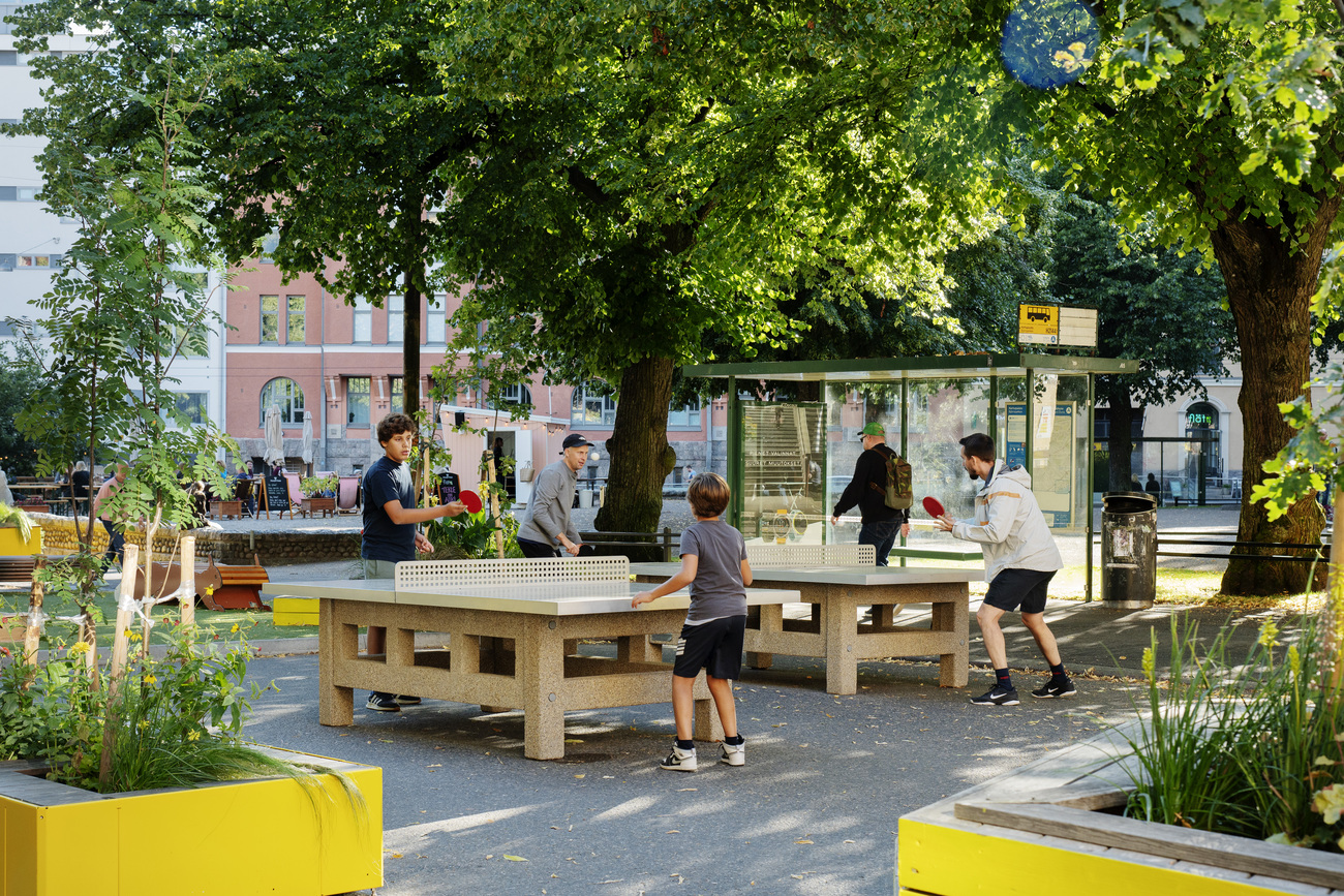 People playing ping pong in Helsinki Bear Park in Kallio neighbourhood.
