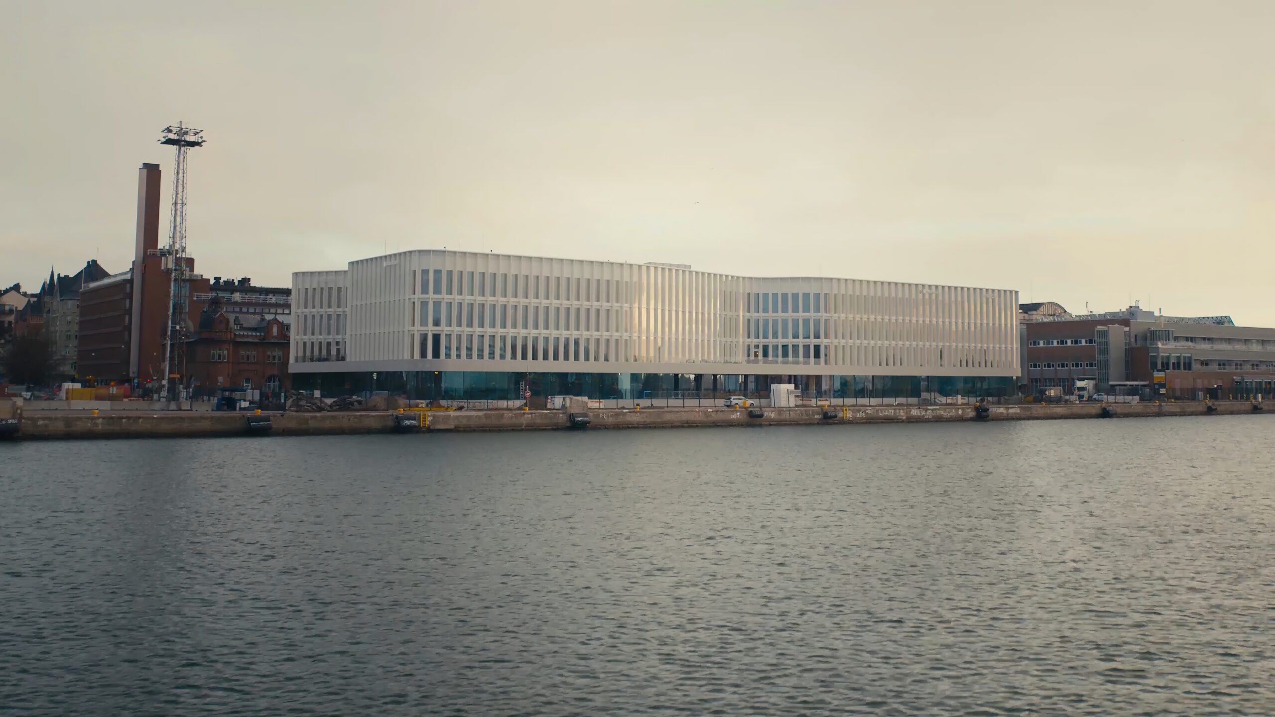 a building next to water