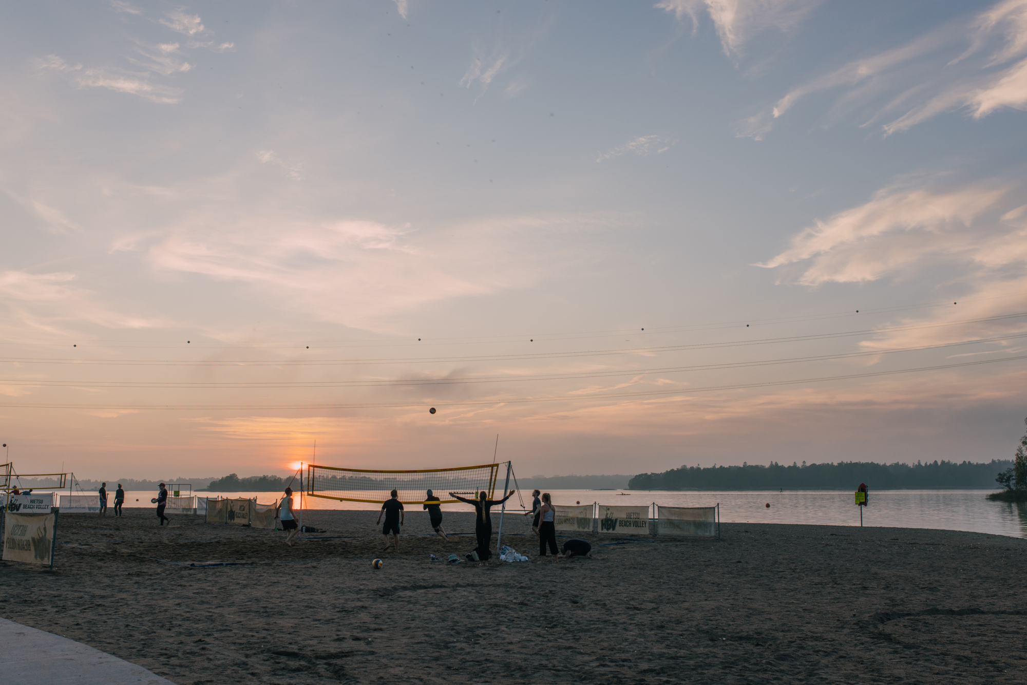 a group of people on Hietaranta Beach one of the best swimming places in Helsinki