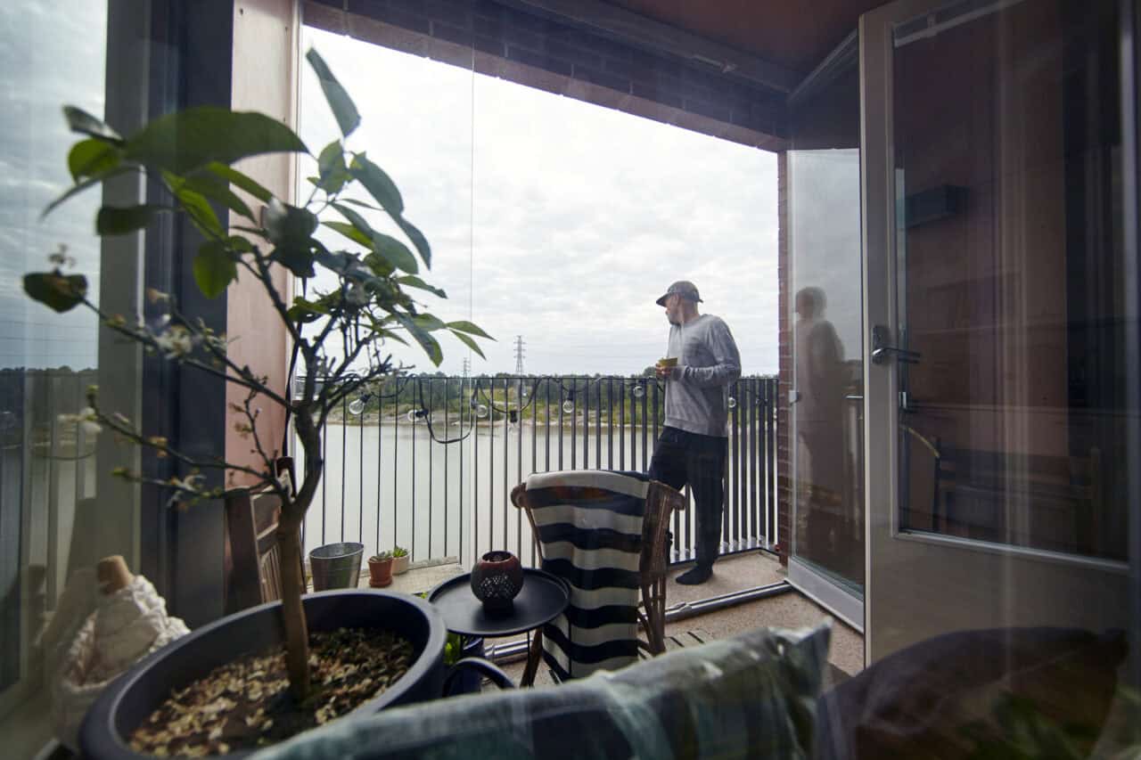 Man on a balcony in Kalasatama