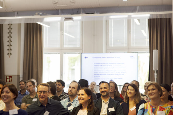 Audience at a presentation on exceptional media attention in 2023