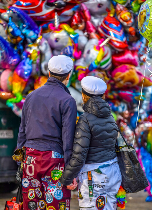 People and May Day balloons in Helsinki.