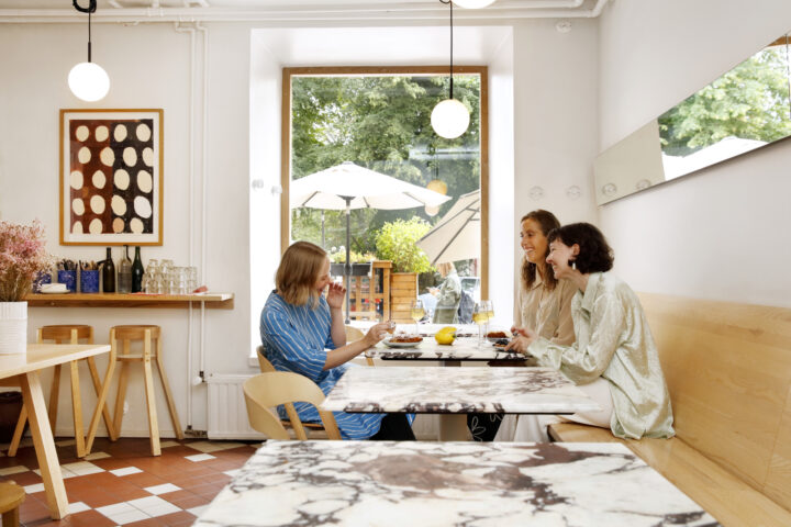 Young women sitting at the Way Bakery
