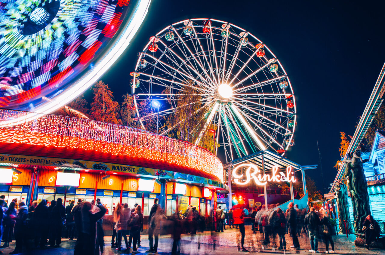 a ferris wheel and a crowd of people