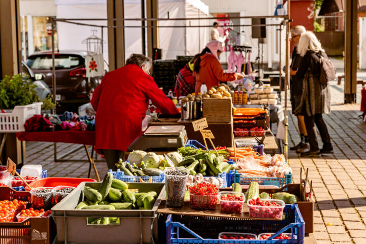 a group of people at a market