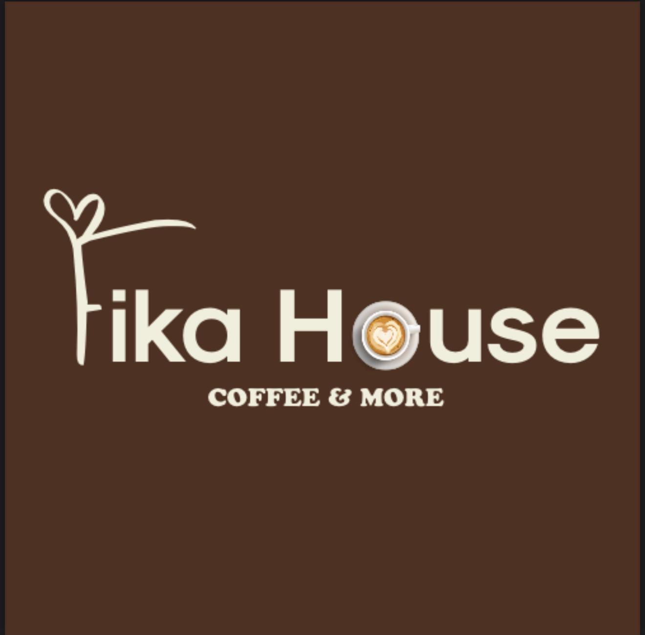 Fika House i vita bokstäver mot en svart bakgrund.