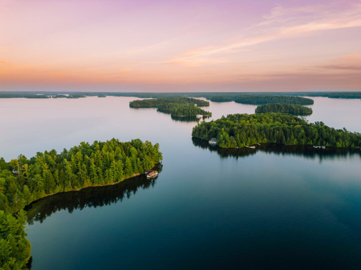 Serene lake surrounded by lush islands.